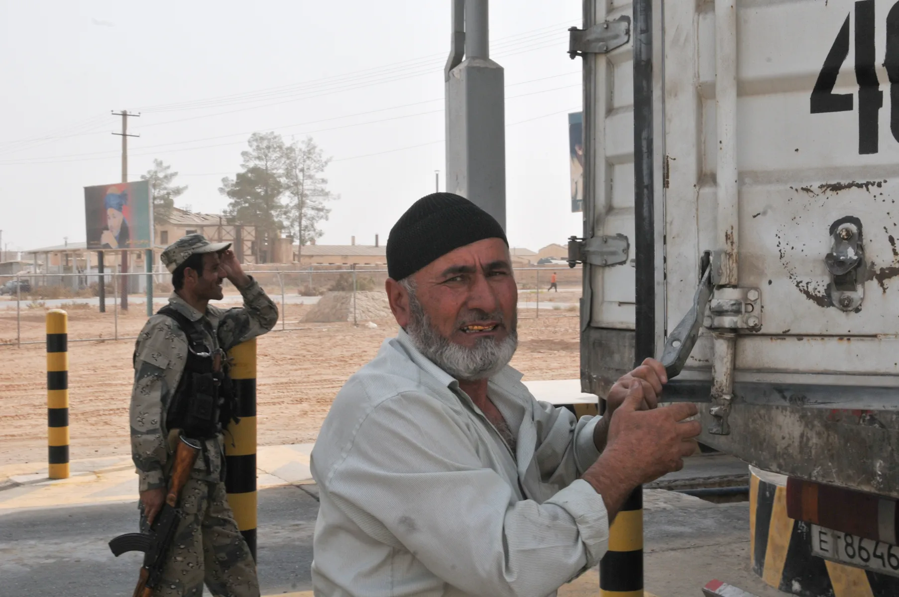 Vehicles and trucks near an international border crossing