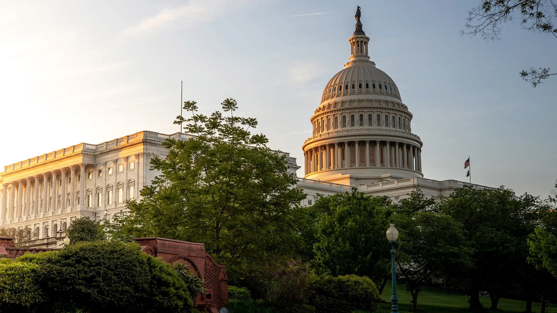 The United States Capitol building at sunrise